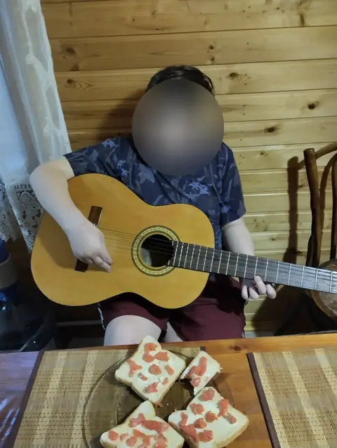 Акустическая гитара